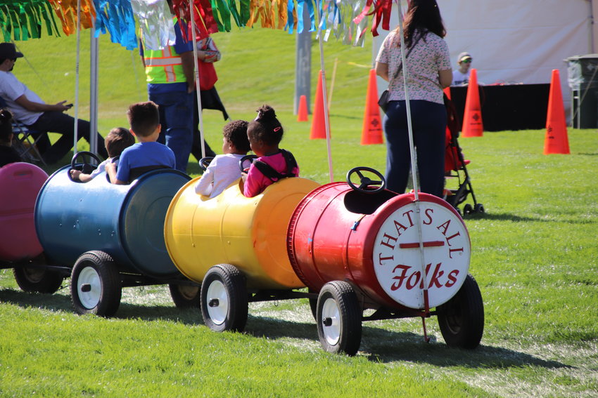 The kid's festival train makes another tour around the grounds of Thornton's Harvest Fest at Community Park Oct. 2.